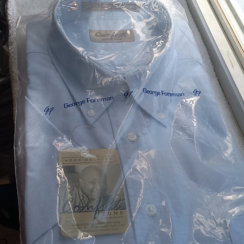 NEW.  BLUE SHORT-SLEEVE SHIRT BY GEORGE FOREMAN.  SIZE 18.BIG